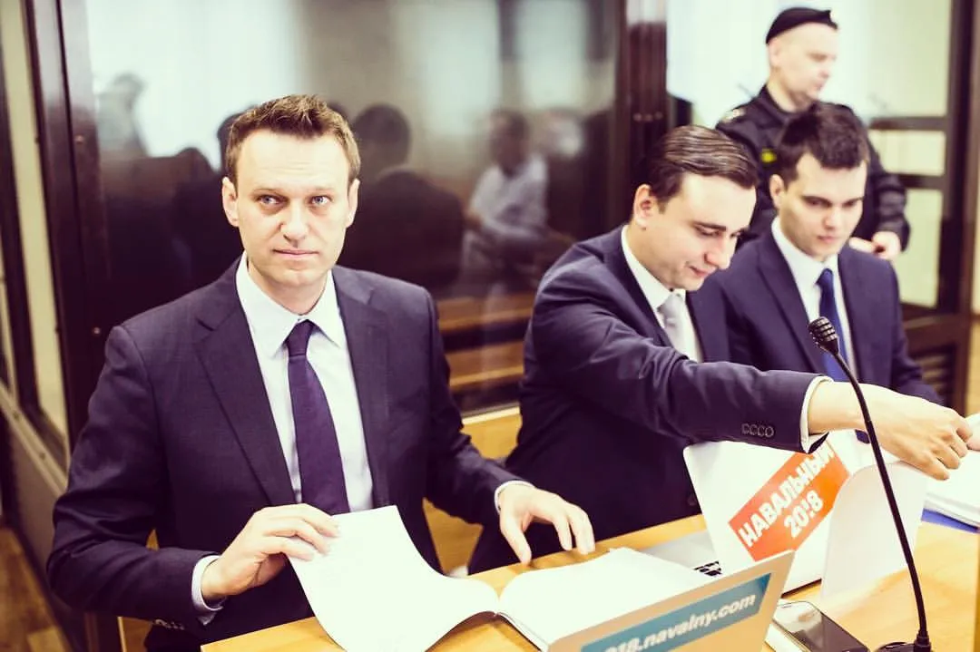 At the hearing with Alisher Usmanov. He himself didn’t show up—got stuck in traffic. Right now in…